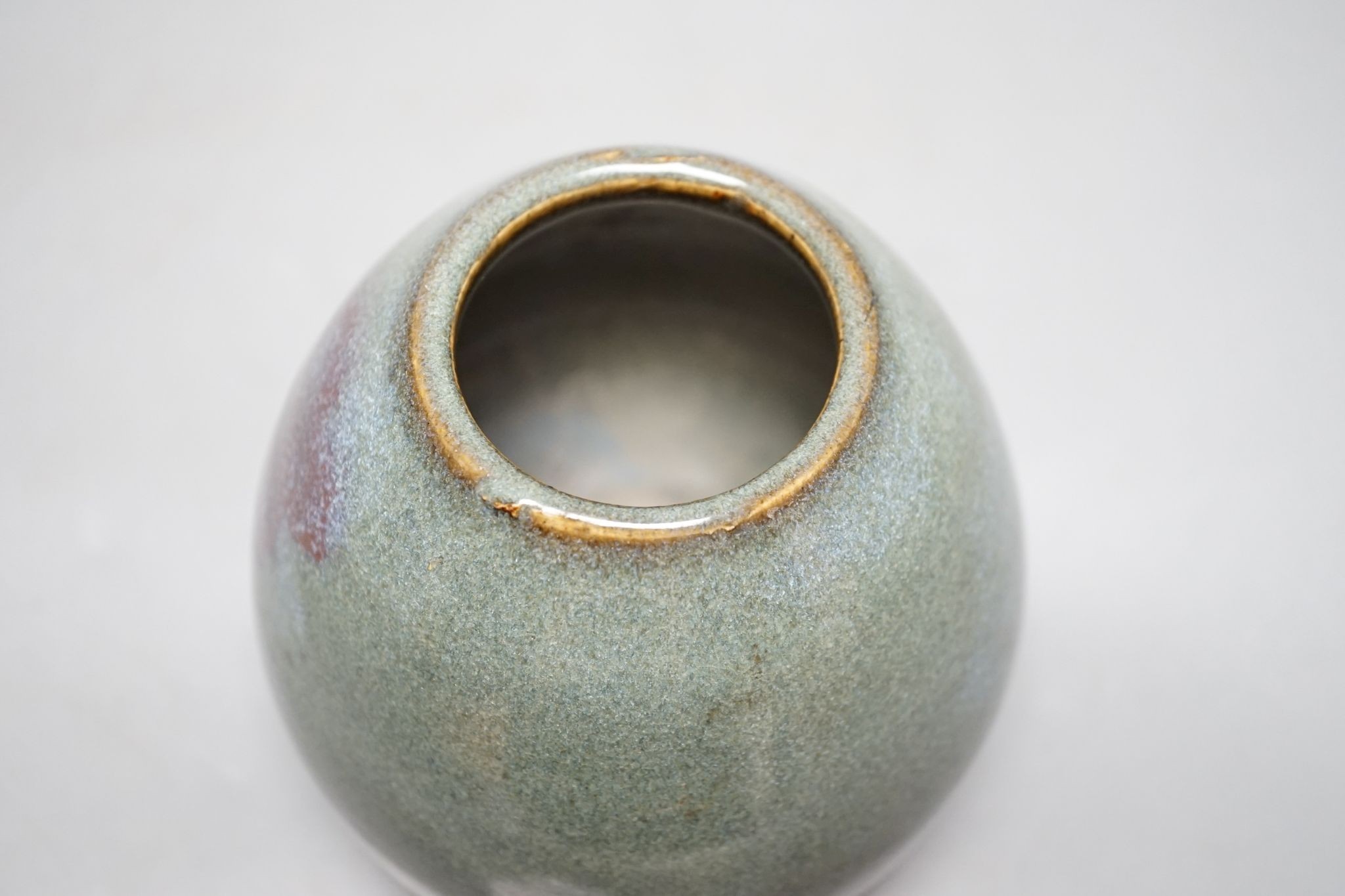 A Chinese jun-type type bud vase, Qing or earlier, 14 cms high.